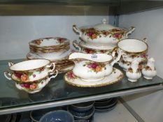 A quantity of Royal Albert 'Old Country Roses' dinnerware to include two tureens,