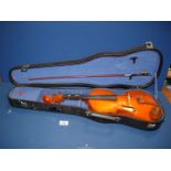 A Stentor Student Violin with bow and case.