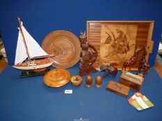 A quantity of treen including marquetry tray, model yacht, pair of giraffes, etc., some a/f.