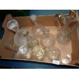 A quantity of glass decanters including ships decanter, claret jug and carafe.