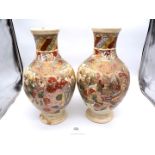 A pair of modern Satsuma style vases, 17 1/2'' tall, one been extensively repaired.