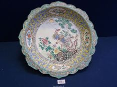 A large Chinese enamelled Charger with bird decoration, Qianlong six character seal, 1736-1795,