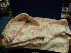 A Laura Ashley double/king quilt, 100% cotton.