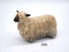 A Beswick long fleeced sheep.