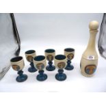 A set of six Laugharne Pottery goblets with decanter and stopper.