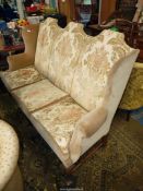 A most elegant high back three seater Sofa/Settee standing on unusual shaped hardwood front legs