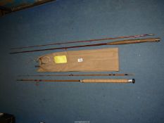 A two piece split cane 8' 6" fly rod and a 7' Hardy Wanless rod 7/8, refurbished.