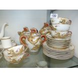 A quantity of Chinese teaware with dragon design including teapot,