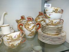 A quantity of Chinese teaware with dragon design including teapot,