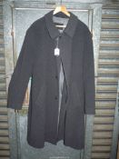 A gents Jaeger wool/polyester/cashmere mix overcoat in dark grey, size 44R.