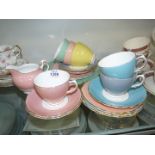 A part Colclough, Harlequin bone china tea set including six cups and saucers, six tea plates,