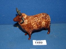 A Shebeg Pottery (Isle of Man) four hoirned sheep, marked Sandra L.