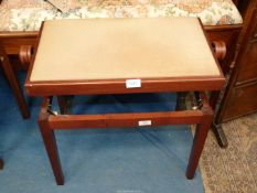 A Satinwood framed Piano Stool adjustable for height by rotation of a knob to either side of the