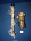 A Normalair Garrett Ltd Manual Hydraulic Pump and a Hale Hamilton (valves) Ltd Pressure Controller.