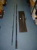 A Seacor Power Surf rod, glass composite, two sectional, 3.6m, with sleeve.