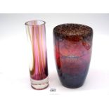 A heavy mottled brown vase with central red sloping band and smooth rolled rim,
