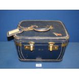 A navy blue leather Vanity Case with fitted mirror and tray,