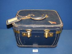 A navy blue leather Vanity Case with fitted mirror and tray,