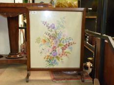 A square wood framed fire screen having embroidered flower sprays scene on cream ground,