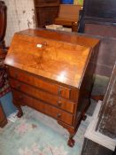 A cross-banded golden Walnut and other woods 1930s/40s Bureau,