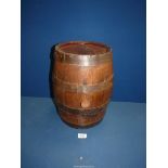 A wooden barrel with stopper, 14" tall.