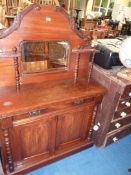 A circa 1900 Mahogany Chiffonier/Sideboard having a frieze drawer and a air of opposing doors below,