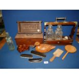 A quantity of miscellanea including a Tantalus with two decanters (a/f), a Treen brick mould,