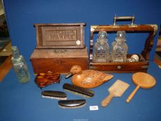 A quantity of miscellanea including a Tantalus with two decanters (a/f), a Treen brick mould,