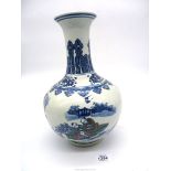 An Oriental vase with six character mark to base surrounded by two concentric circles,