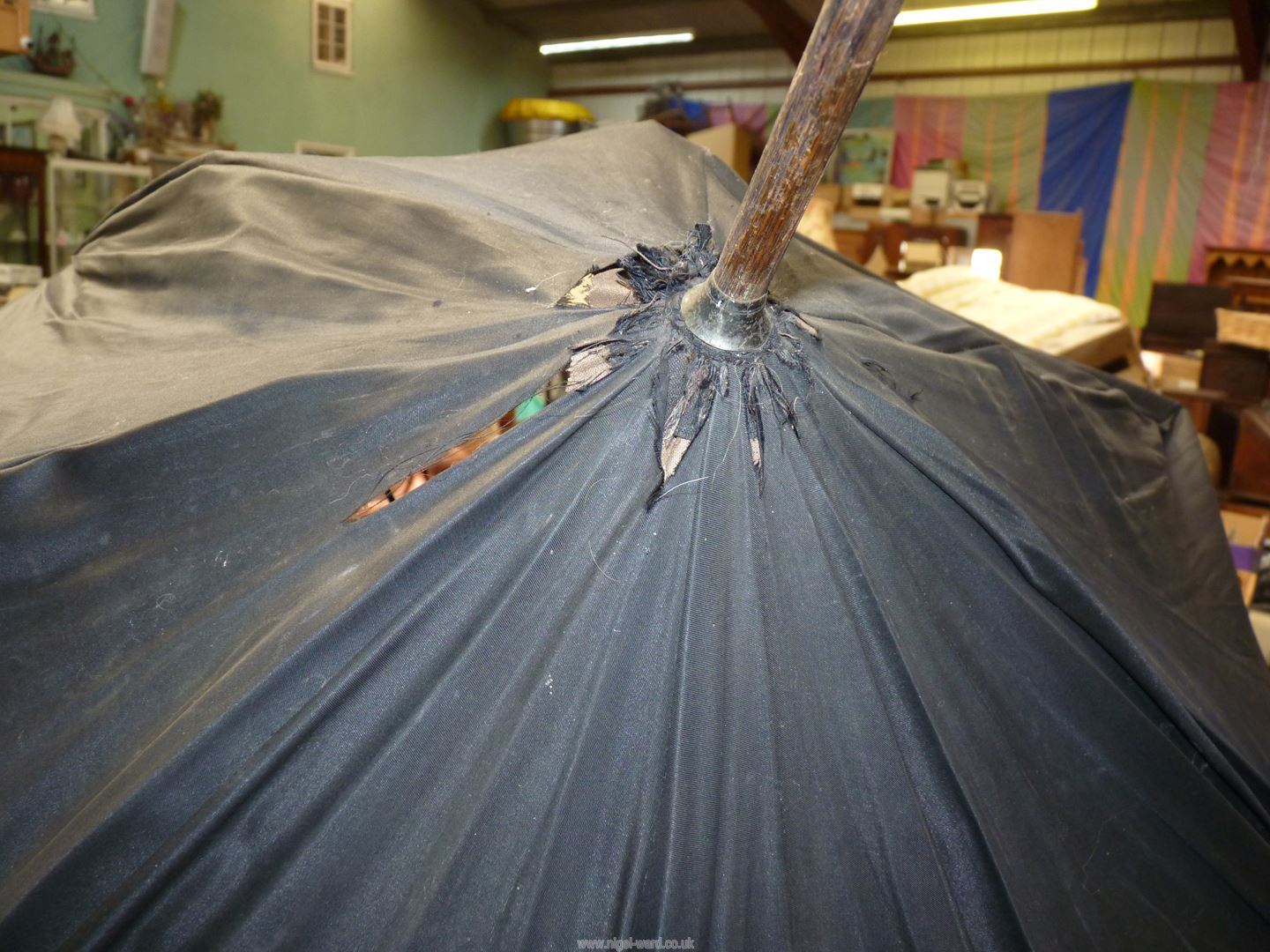 A parasol with wooden shaft and carved elephant handle plus a black umbrella with wooden shaft, - Image 6 of 7