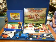 A box of vintage toys to include Toto Poly and Bayko and cars etc.