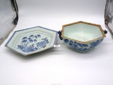A Chinese early 18th century blue and white hexagonal tureen base, 12" wide and stand, 16" wide.