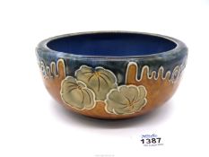 A Royal Doulton Lambeth bowl in blue and ochre with green leaves, 7 3/4" diameter x 3 1/2" deep.