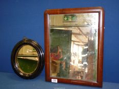 A rectangular mirror (was part of a dressing table), 14" wide x 18" tall and a black oval mirror,