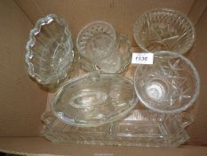 A box of cut glass vases, jelly moulds etc.