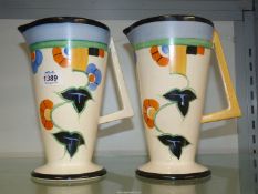A pair of colourful Art Deco jugs by Sudlows Burslem, some crazing, 8 3/4" tall.