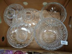 A large lead crystal fruit bowl and an oval fruit bowl and three trifle bowls including Wedgwood