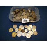 A tub of foreign coins, coins from Portugal, Turkey and Denmark etc.