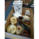 A small quantity of china including John Beswick Thelwell figure, Poole Dolphin and Penguin,