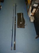 A Seacor Power Surf rod, glass composite, two sectional, 3.6m, with sleeve.