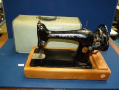 A cased Singer hand sewing machine, no. Y 3112741.