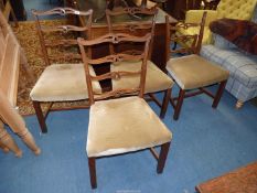 A set of four Georgian design Mahogany framed broad seated ladder-back Dining Chairs having olive