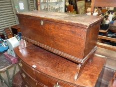 A collectable six plank Elm Dirk Chest the sides having arched support details the lid lifting to