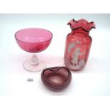 A small quantity of cranberry glass including Mary Gregory style with fluted rim,
