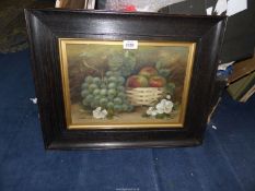 A wooden framed Oil of a still life of fruits and blossoms, indistinctly signed lower left,