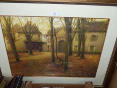 A large framed and mounted Print depicting a French chateau courtyard with trees and bench,