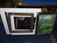 Three picture frames of various sizes and a Print of Parklands.