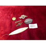 A 9ct gold link bar brooch, two silver brooches (pins missing) and an enamel lapel pin etc.