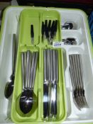 A Stellar six place cutlery set and two serving spoons in cutlery tray.