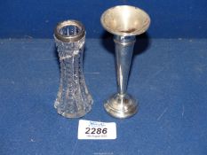 Two small single stem vases, one of silver the other glass with silver band, hallmarks rubbed.